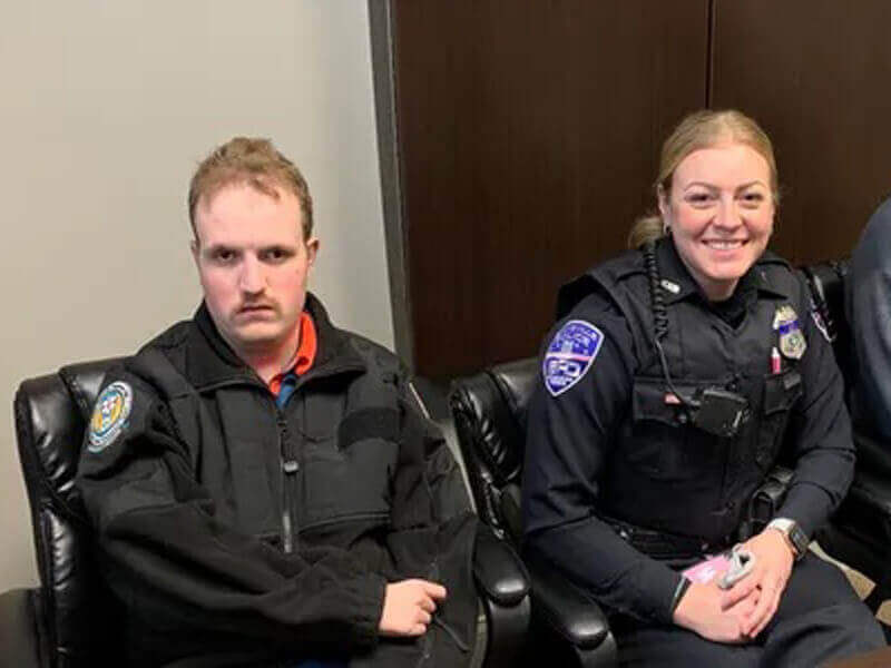 Police Officers Helping Community